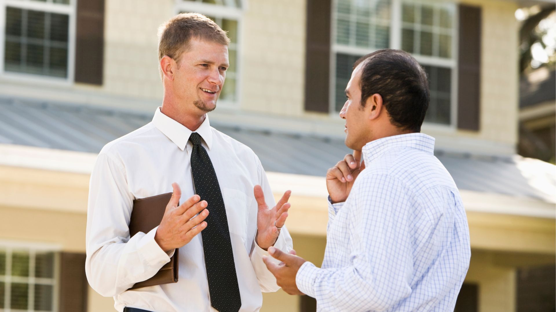 Two professionals discussing the role sheriffs play in South Africa