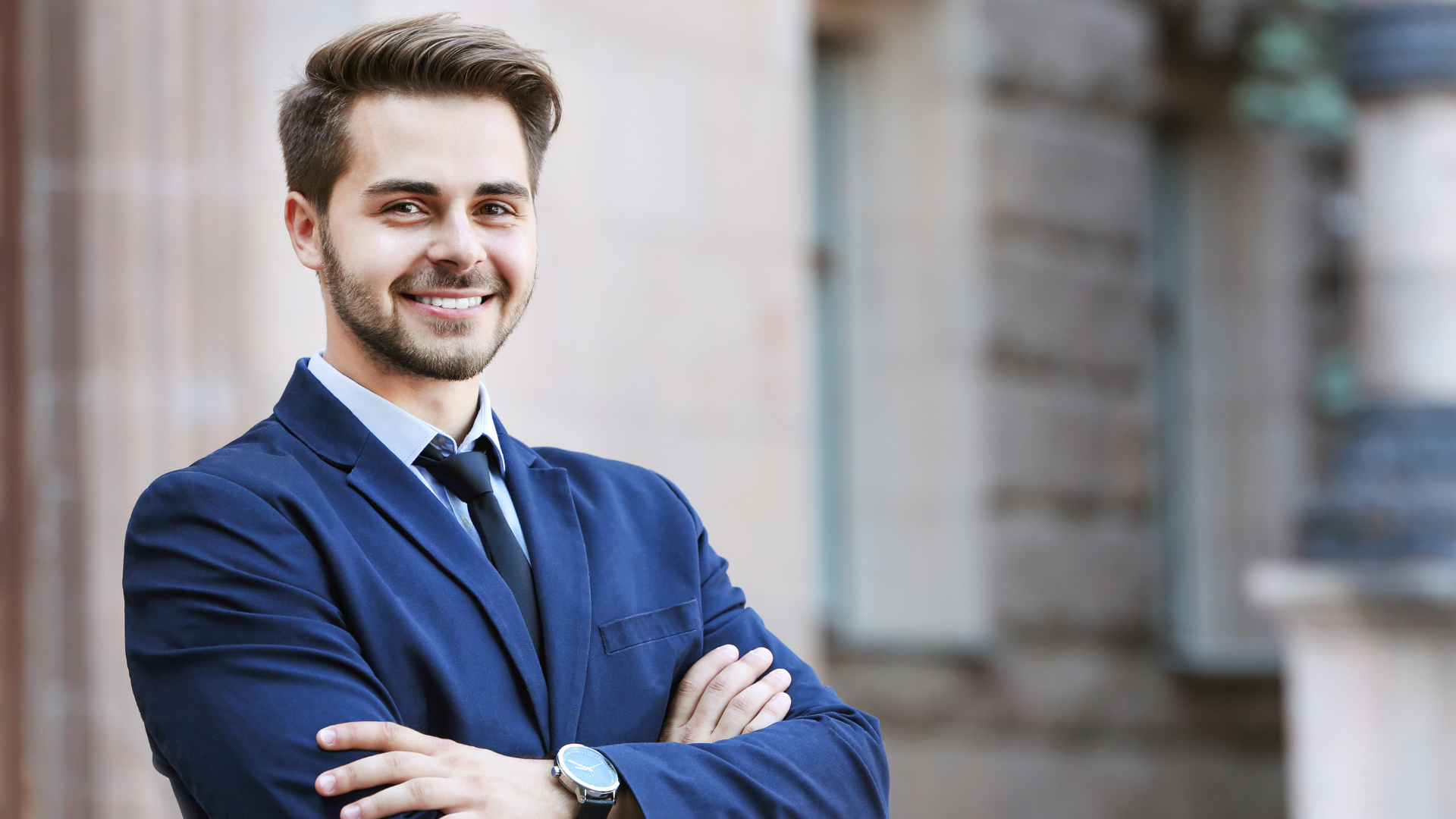 A young legal professional standing outside the Magistrates' Court in South Africa