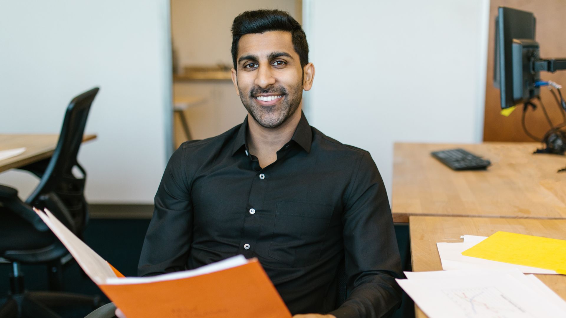 A young professional happy as he is well prepared for the conveyancing exam