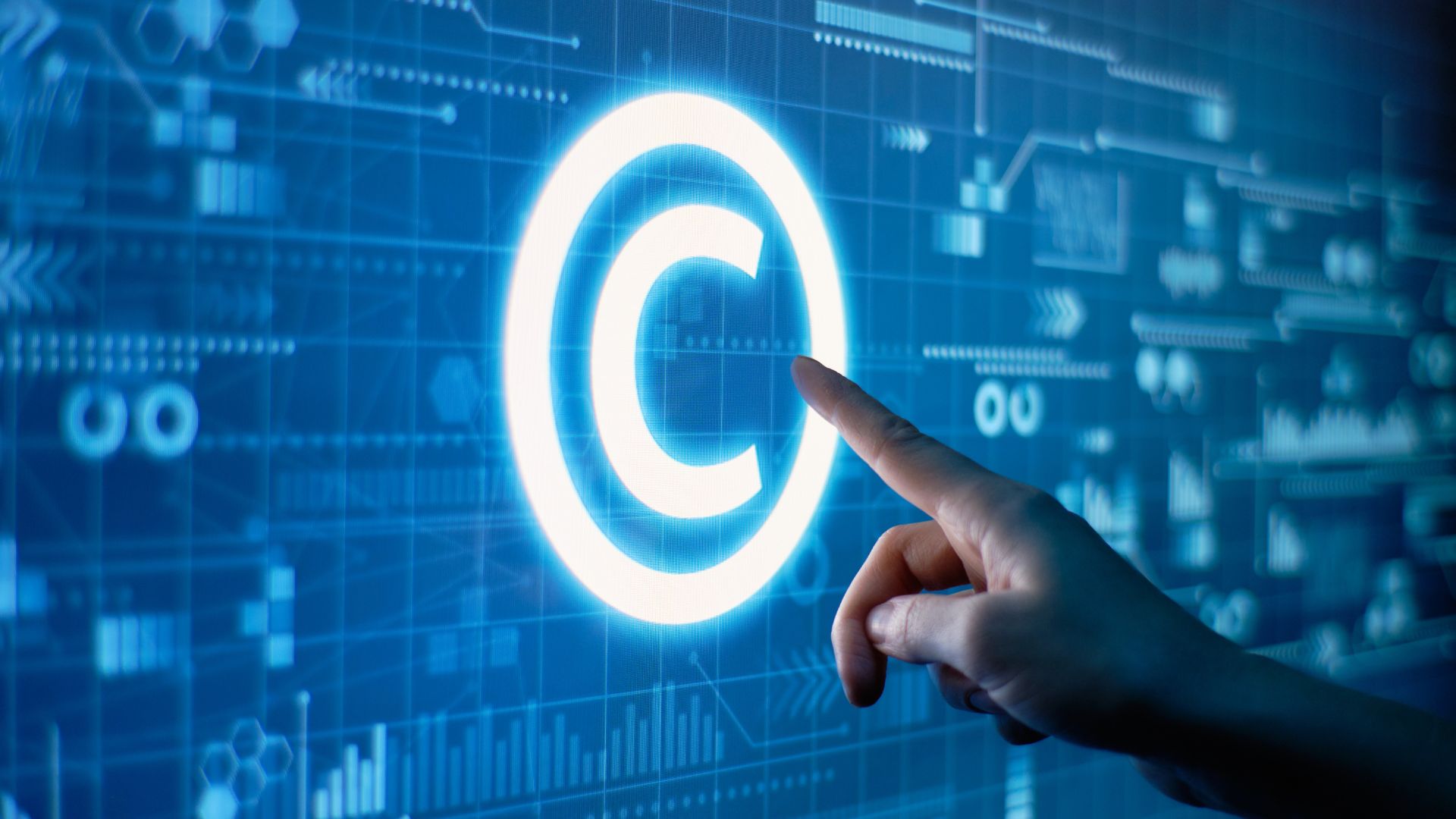A digital copyright notice with a hand reaching for it, this is a powerful tool in preventing copyright infringement
