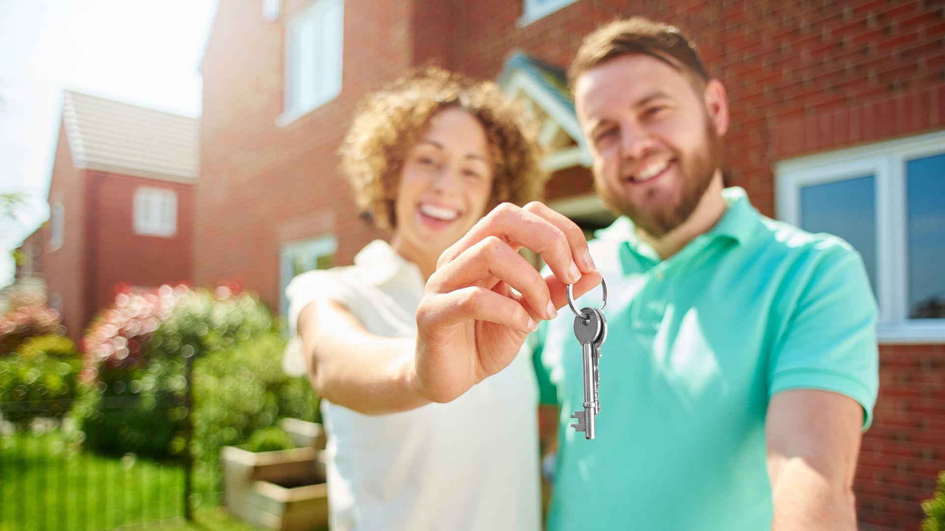 A couple who have just bought a home, unaware of the hidden costs of home ownership