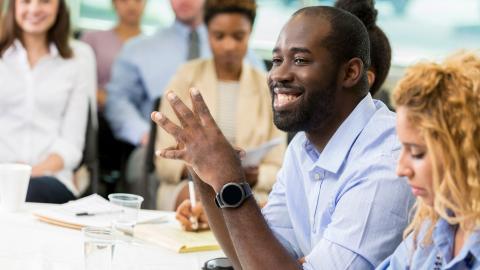 A group of professionals engaged in continuous learning to improve themselves
