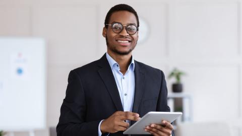 A legal professional accessing a government gazette on their tablet