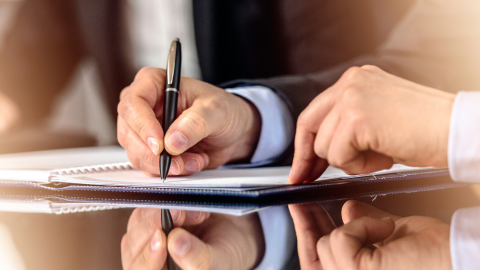 A document being signed, this can often be verified by a Commissioner of Oaths
