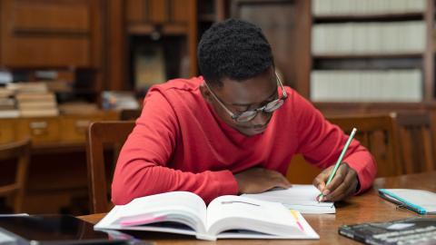 A student studying for the notarial practice exam