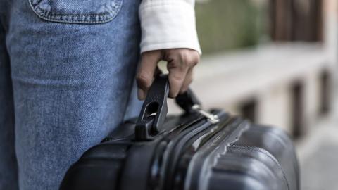 A South African with bag packed ready to emigrate