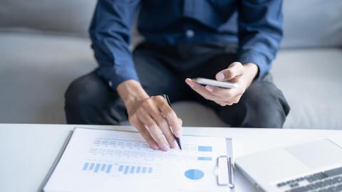 A sole practitioner examining their cash flow statement
